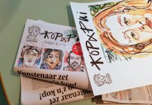 Winkeliers Jan Eef samen in een krant en openluchttentoonstelling