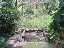 Tuin volleggen met tegels mag niet meer in Oud-West