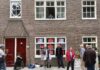 Protest tegen verkoop sociale huurwoning Spaarndammerbuurt