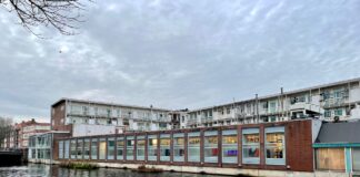 Plan voor woningen op dak Aldi Postjesweg