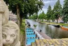 Nieuw terras langs Admiralengracht, deel buurtbewoners tegen