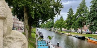 Nieuw terras langs Admiralengracht, deel buurtbewoners tegen