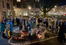 Bewoners verlichten Kolenkitbuurt met groot hart van kaarsen