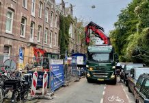 Scanfiets ingezet tegen illegaal geplaatste bouwcontainer en steiger