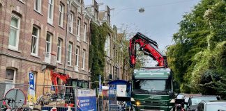 Scanfiets ingezet tegen illegaal geplaatste bouwcontainer en steiger