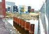 Nieuwe grachten Houthaven volgende week deels gevuld
