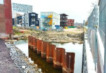 Nieuwe grachten Houthaven volgende week deels gevuld