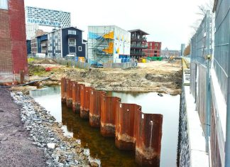 Nieuwe grachten Houthaven volgende week deels gevuld